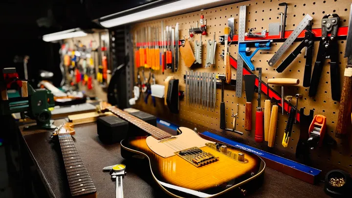 Guitar repair and setup at The Guitar Surgeon workshop, Auckland — April 2026