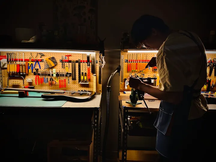 Guitar repair and setup at The Guitar Surgeon workshop, Auckland — April 2026