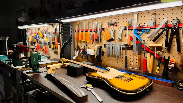 Guitar repair and setup at The Guitar Surgeon workshop, Auckland — April 2026