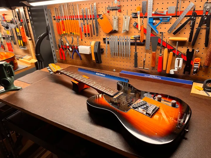 Guitar repair and setup at The Guitar Surgeon workshop, Auckland — April 2026