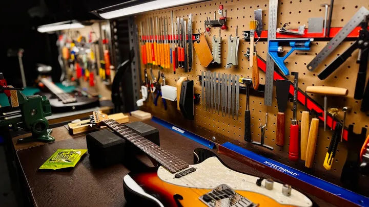 Guitar repair and setup at The Guitar Surgeon workshop, Auckland — May 2026