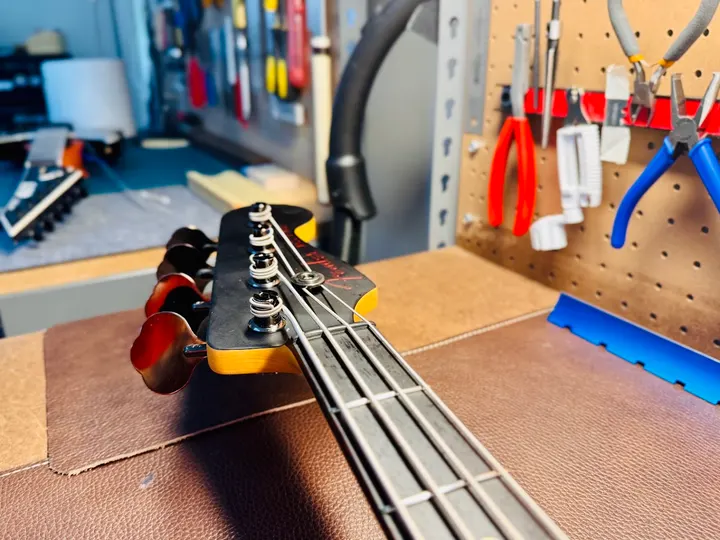 Guitar repair and setup at The Guitar Surgeon workshop, Auckland — May 2026