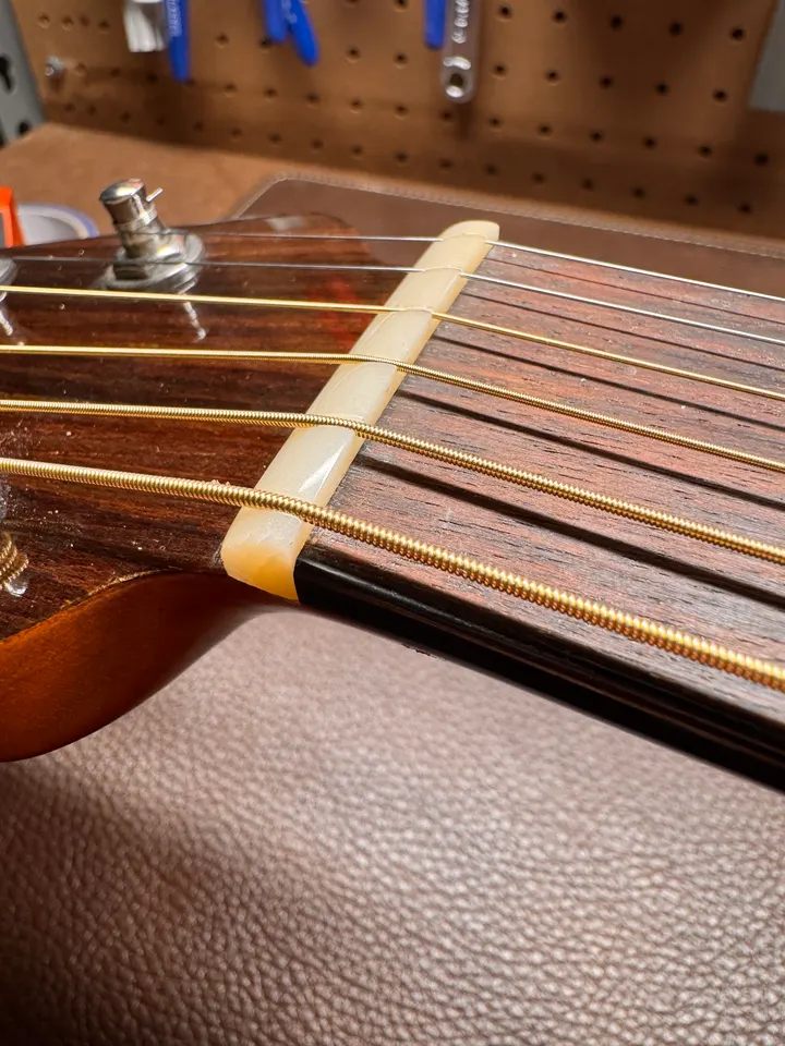Guitar repair and setup at The Guitar Surgeon workshop, Auckland — May 2026