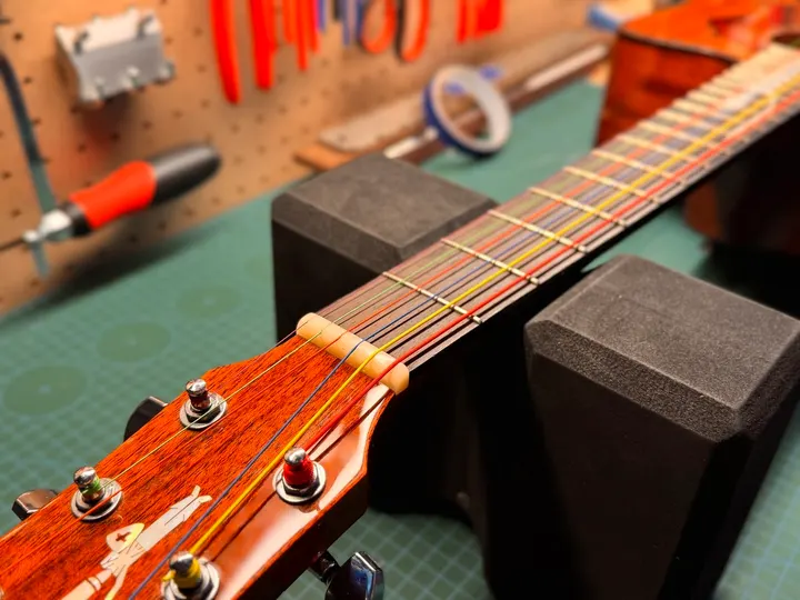 Guitar repair and setup at The Guitar Surgeon workshop, Auckland — May 2026