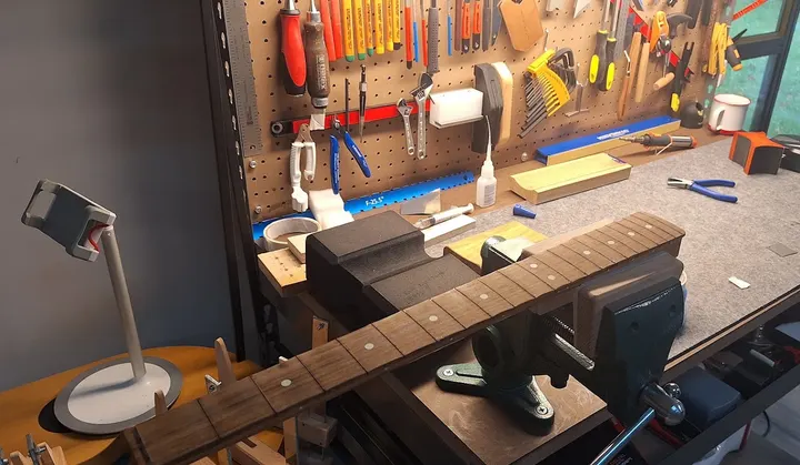 Guitar repair and setup at The Guitar Surgeon workshop, Auckland — May 2026