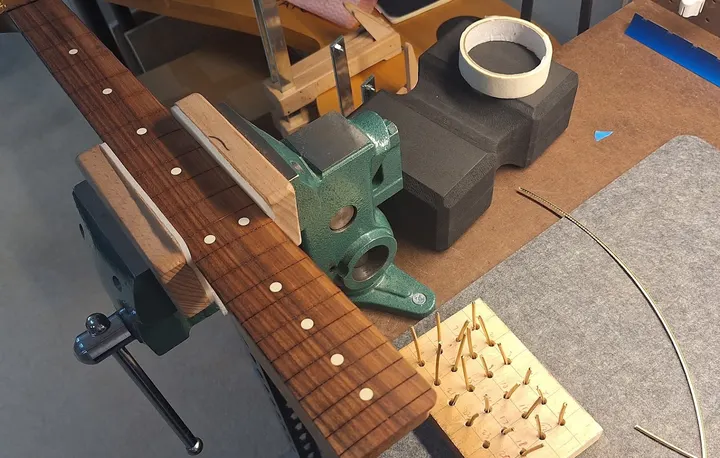 Guitar repair and setup at The Guitar Surgeon workshop, Auckland — May 2026