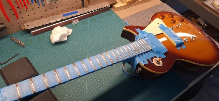Guitar repair and setup at The Guitar Surgeon workshop, Auckland — May 2026