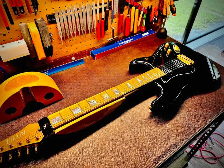 Guitar repair and setup at The Guitar Surgeon workshop, Auckland — May 2026