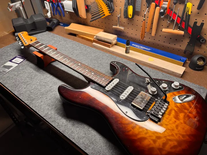 Guitar repair and setup at The Guitar Surgeon workshop, Auckland — June 2026