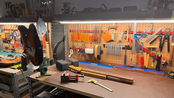 Guitar repair and setup at The Guitar Surgeon workshop, Auckland — June 2026