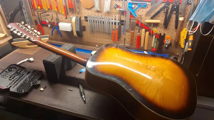 Guitar repair and setup at The Guitar Surgeon workshop, Auckland — June 2026