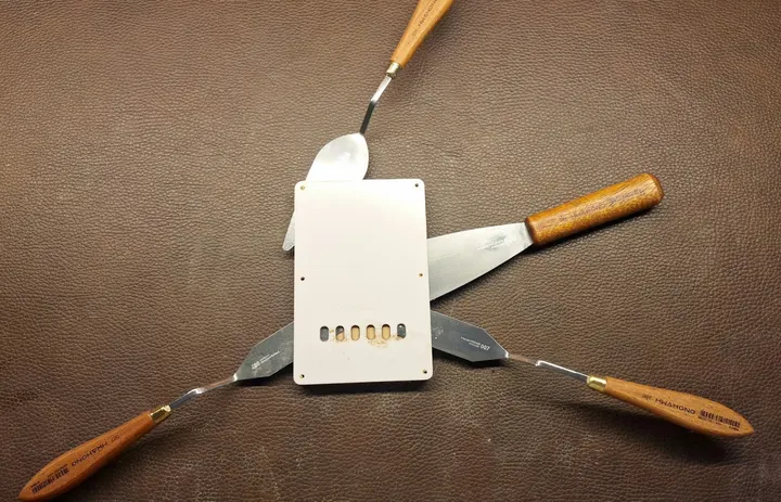 Guitar repair and setup at The Guitar Surgeon workshop, Auckland — June 2026