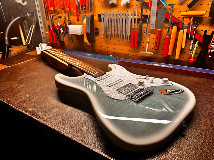 Guitar repair and setup at The Guitar Surgeon workshop, Auckland — June 2026