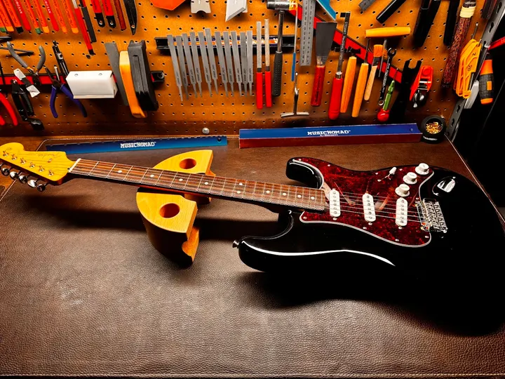 Guitar repair and setup at The Guitar Surgeon workshop, Auckland — June 2026