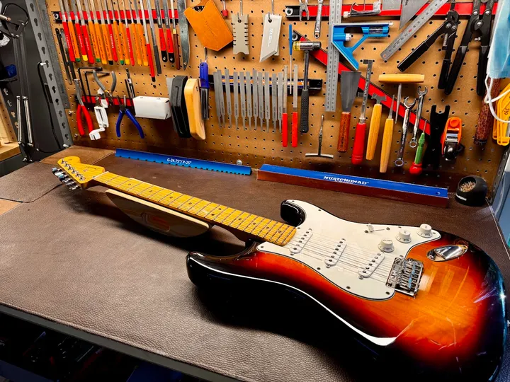 Guitar repair and setup at The Guitar Surgeon workshop, Auckland — June 2026