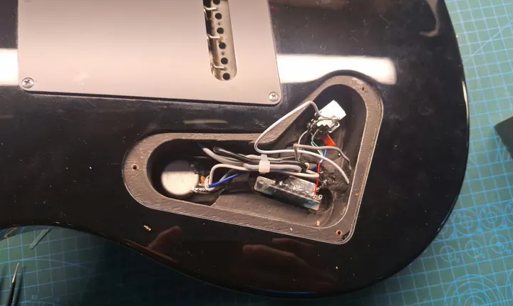 Guitar repair and setup at The Guitar Surgeon workshop, Auckland — June 2026