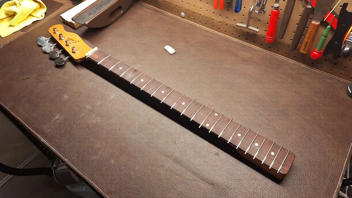 Guitar repair and setup at The Guitar Surgeon workshop, Auckland — July 2026