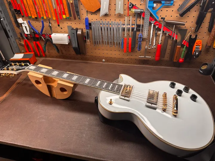Guitar repair and setup at The Guitar Surgeon workshop, Auckland — July 2026