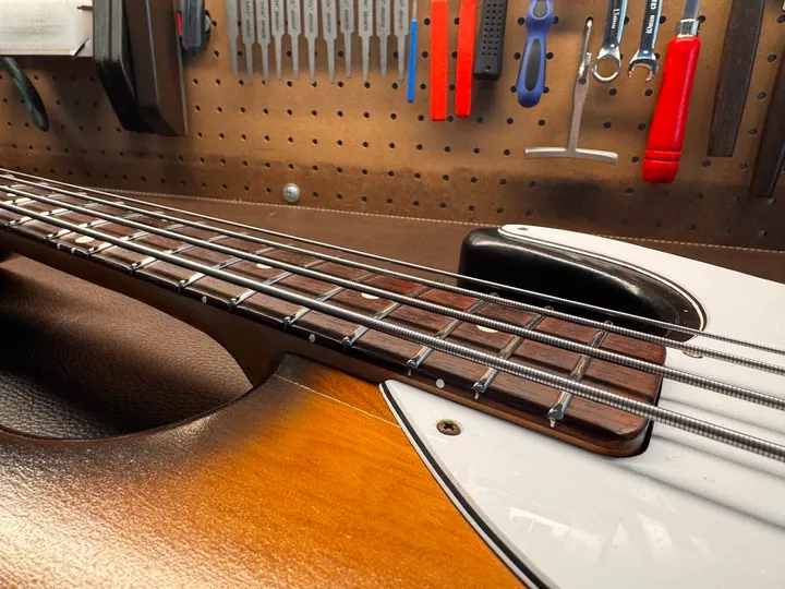 Guitar repair and setup at The Guitar Surgeon workshop, Auckland — July 2026