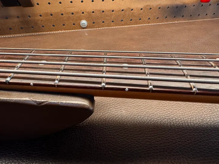Guitar repair and setup at The Guitar Surgeon workshop, Auckland — July 2026