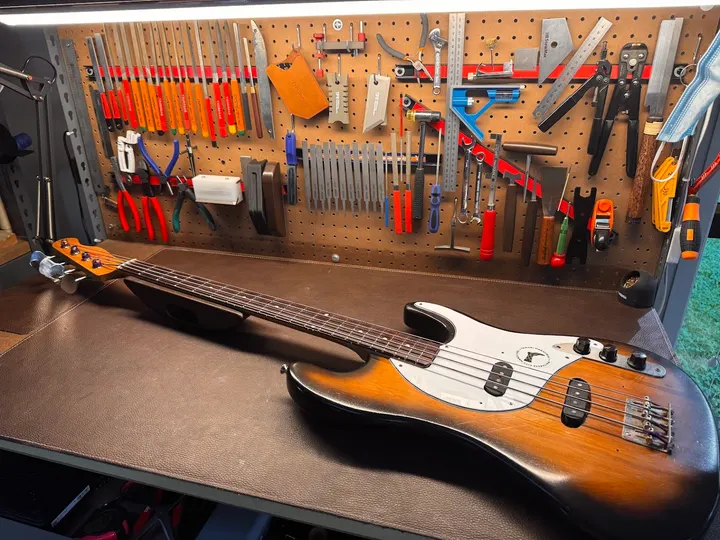 Guitar repair and setup at The Guitar Surgeon workshop, Auckland — July 2026