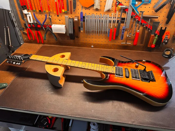 Guitar repair and setup at The Guitar Surgeon workshop, Auckland — July 2026