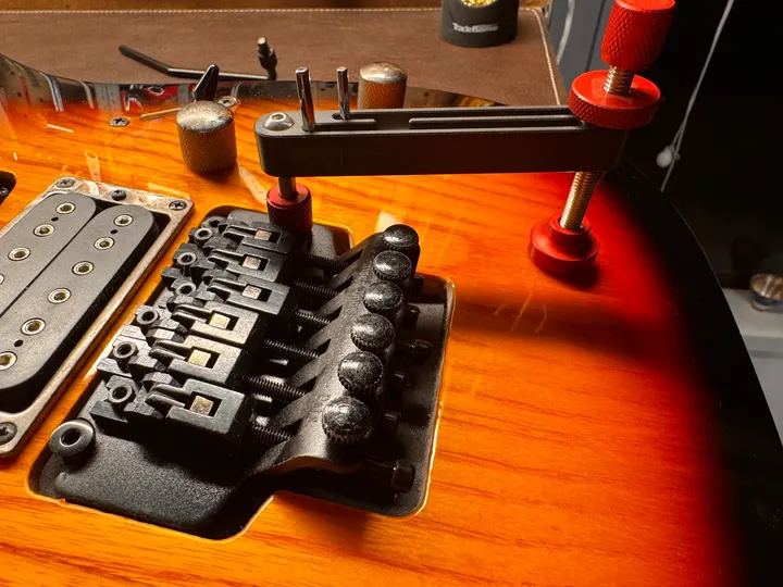 Guitar repair and setup at The Guitar Surgeon workshop, Auckland — July 2026