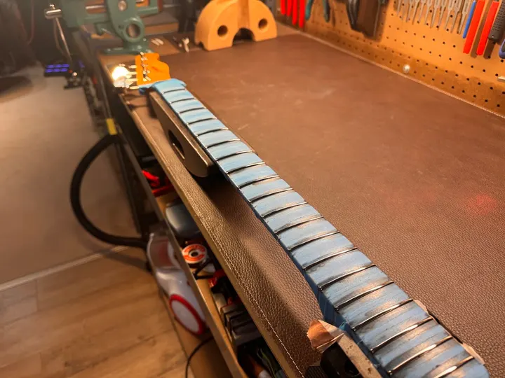 Guitar repair and setup at The Guitar Surgeon workshop, Auckland — August 2026