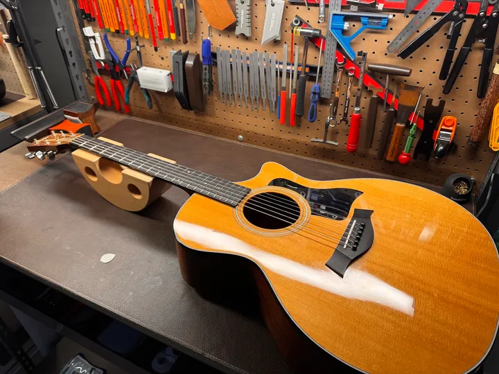 Guitar repair and setup at The Guitar Surgeon workshop, Auckland — August 2026