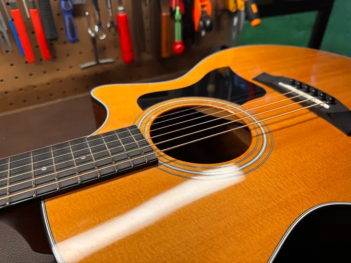 Guitar repair and setup at The Guitar Surgeon workshop, Auckland — August 2026