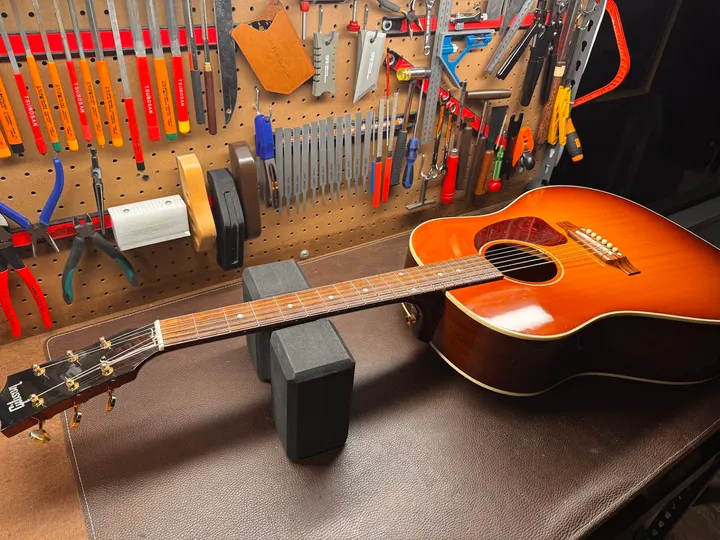 Guitar repair and setup at The Guitar Surgeon workshop, Auckland — August 2026