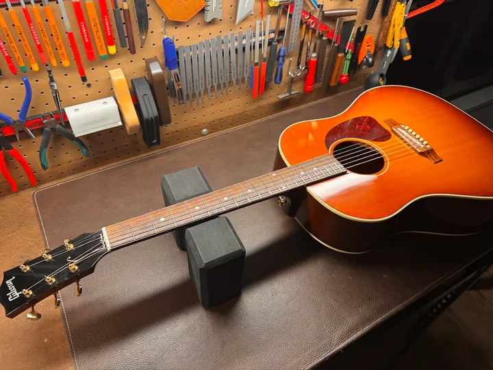 Guitar repair and setup at The Guitar Surgeon workshop, Auckland — August 2026